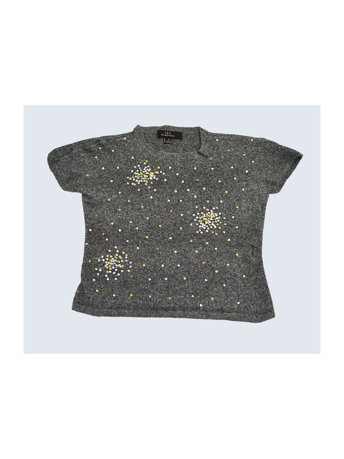Pull d'occasion  T.34 pour fille.